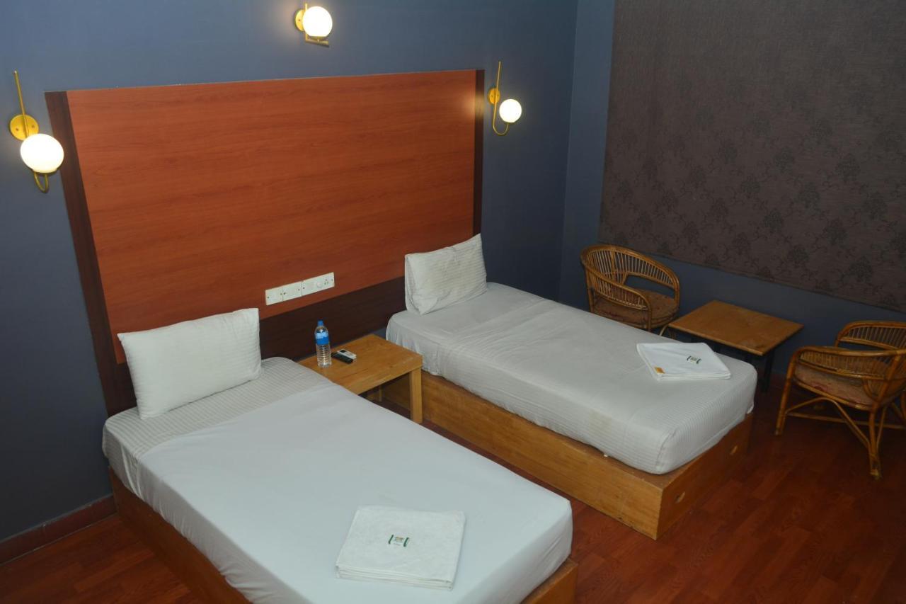 Dejavu Hotel Coimbatore Bagian luar foto