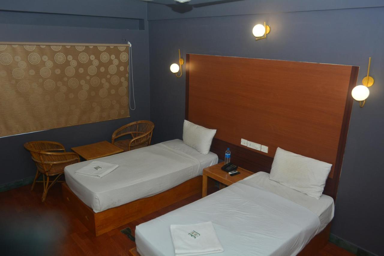 Dejavu Hotel Coimbatore Bagian luar foto