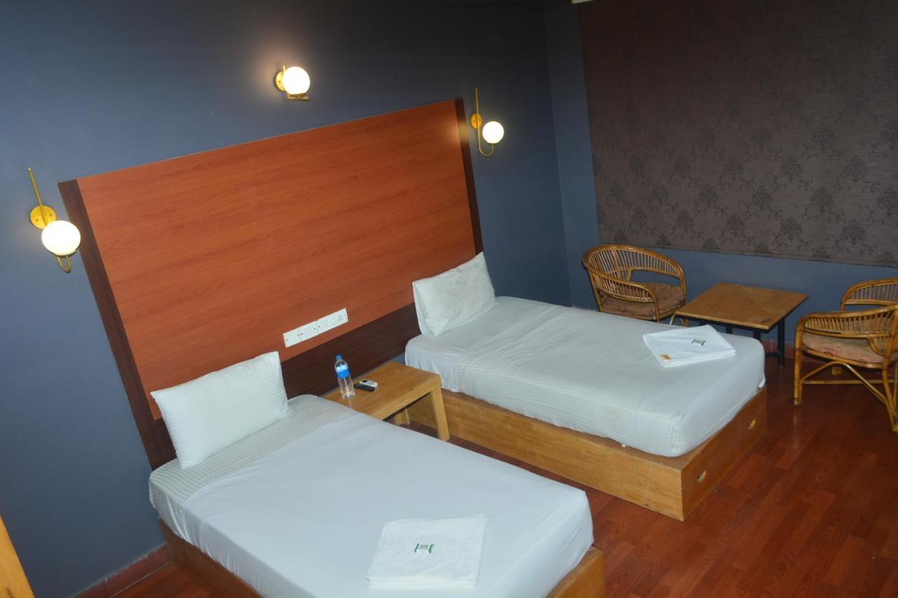 Dejavu Hotel Coimbatore Bagian luar foto