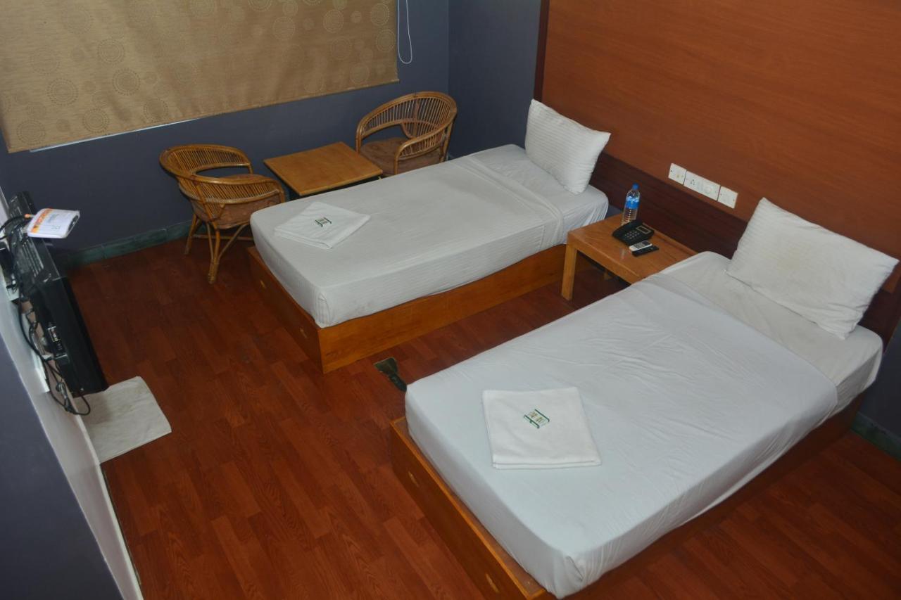 Dejavu Hotel Coimbatore Bagian luar foto