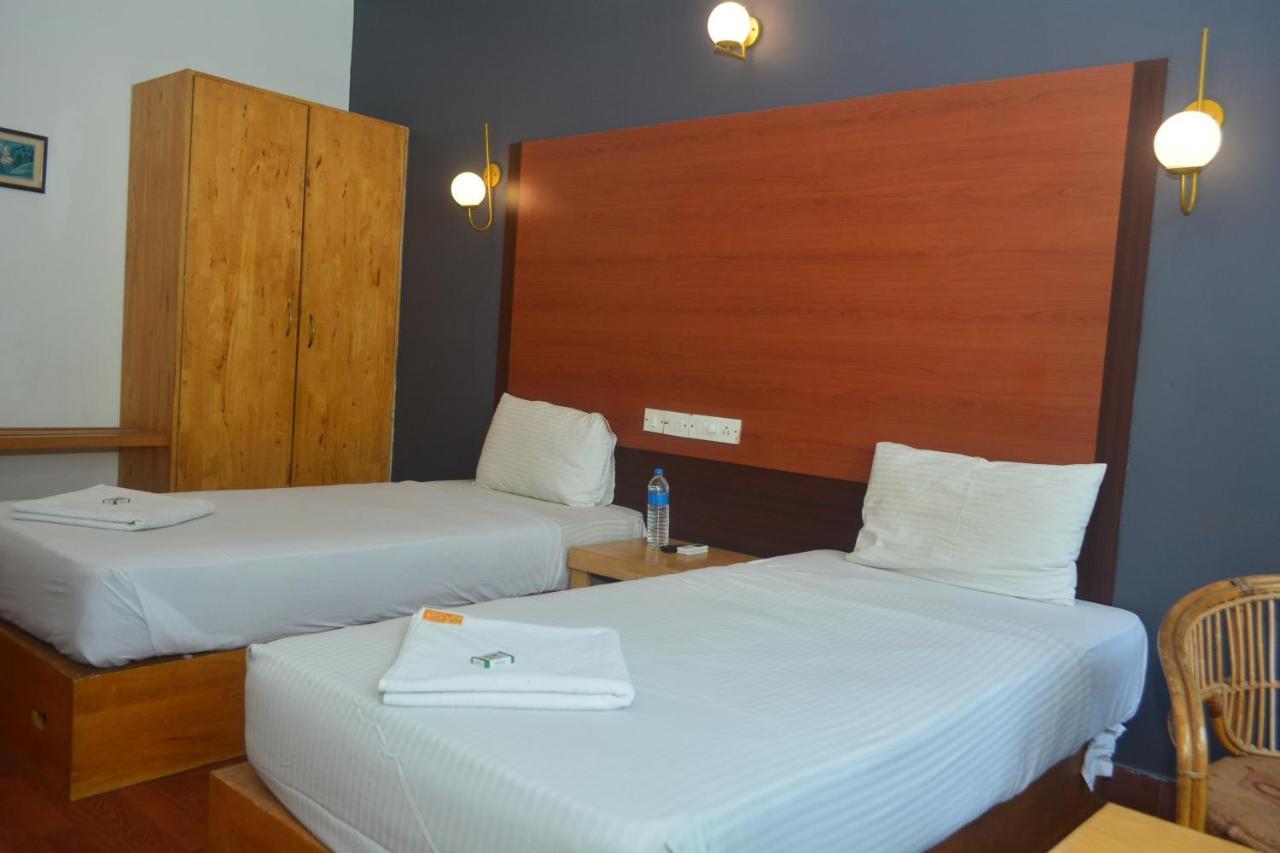 Dejavu Hotel Coimbatore Bagian luar foto