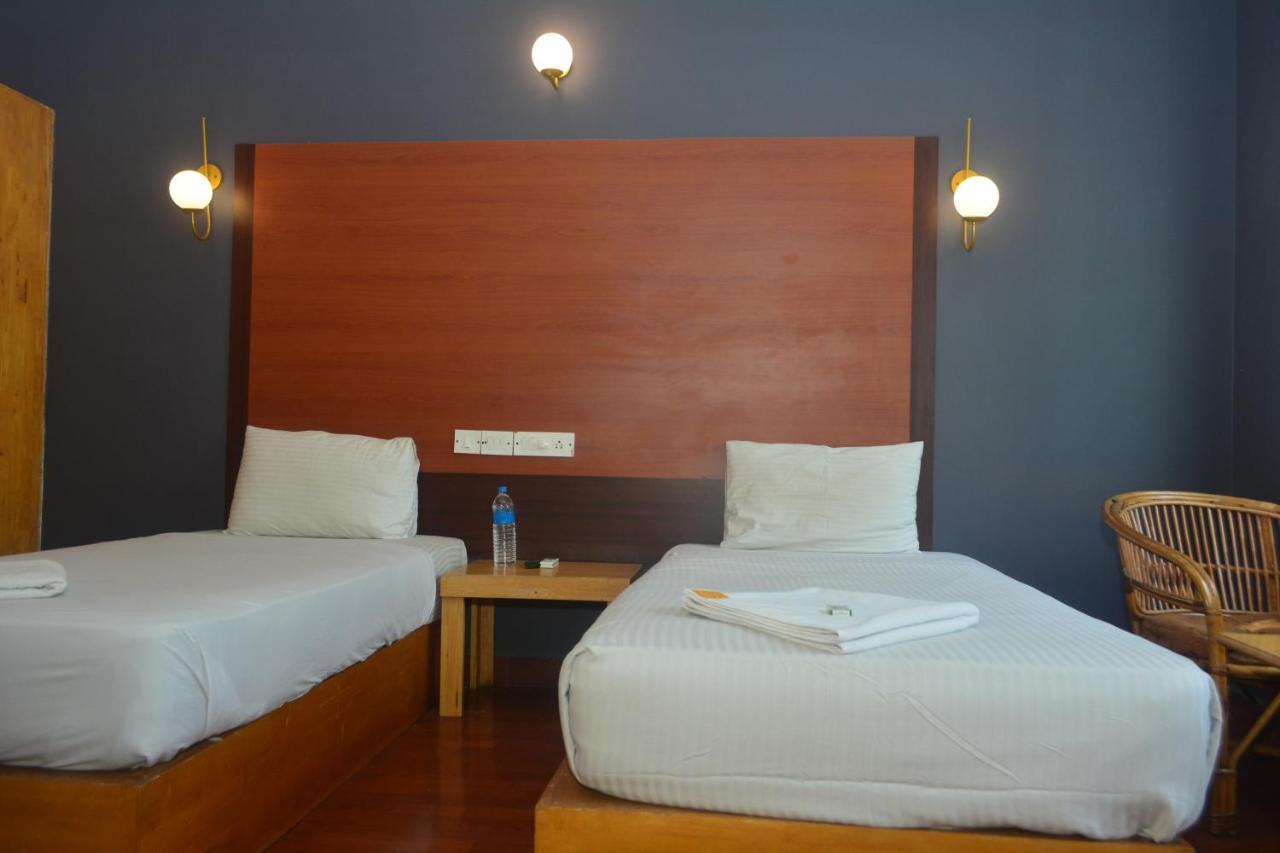 Dejavu Hotel Coimbatore Bagian luar foto