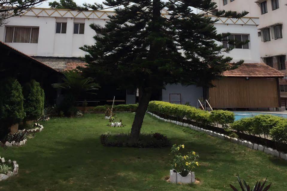 Dejavu Hotel Coimbatore Bagian luar foto